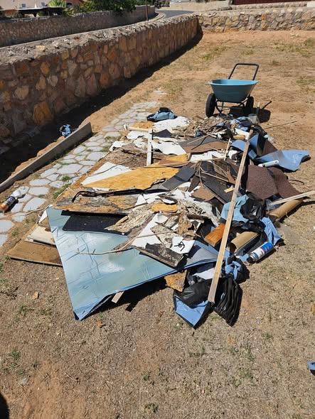 Before restoration - residential yard with debris
